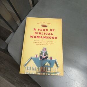 Source Unknown Yellow and Red "A Year of Biblical Womanhood" Paperback